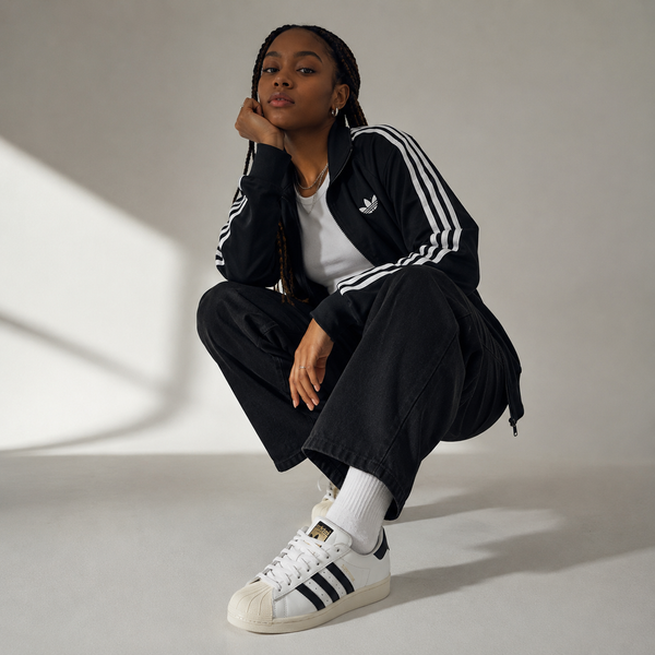 adidas Superstar sneakers featuring the iconic shell toe and three-stripe design